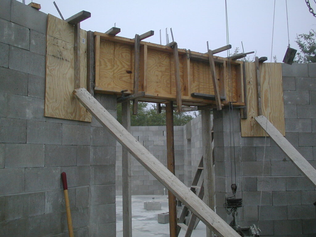 Picture of dry stacked block construction outside front door header forms.
