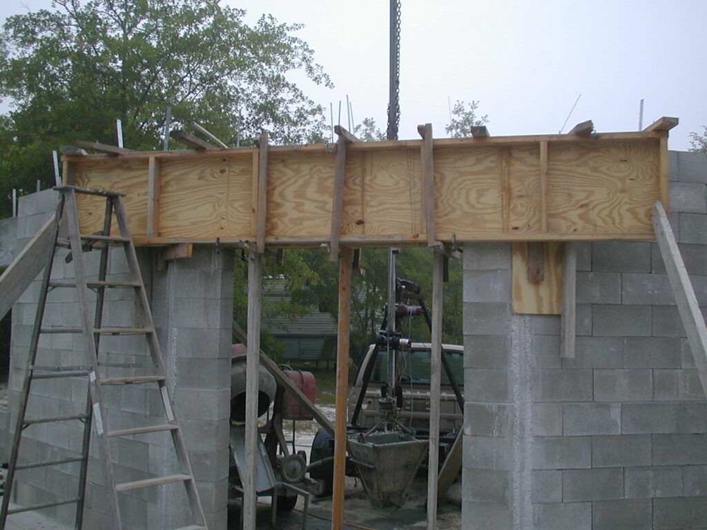 Picture of dry stacked block construction inside front door header forms.