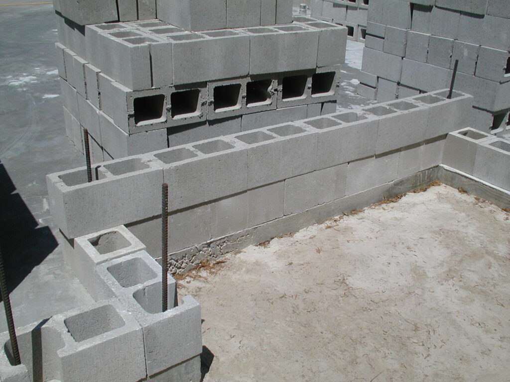 Picture dry stacked block construction second row length issue.
