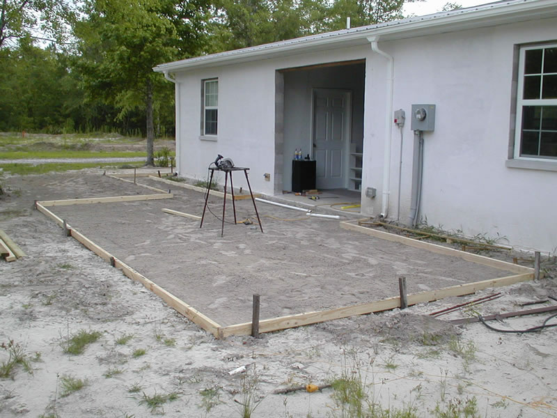 Picture of dry stacked block construction surface bonded garage wall segment. 